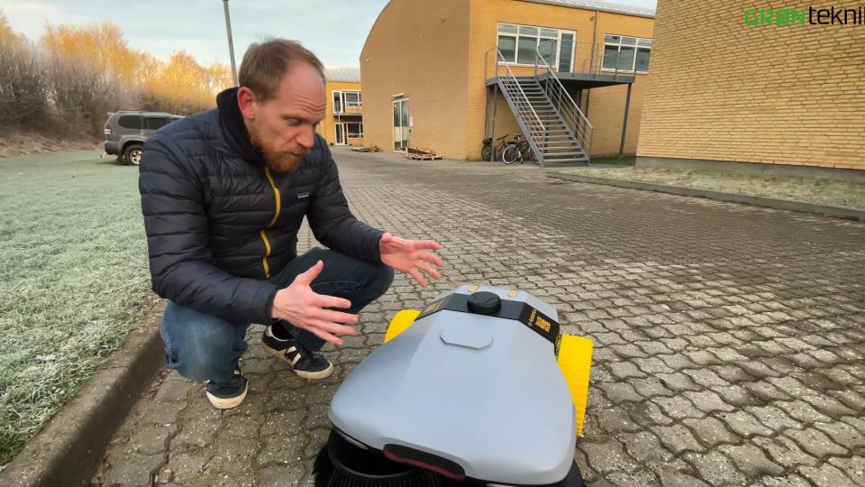 Alf has invented a robot for maintaining paved areas